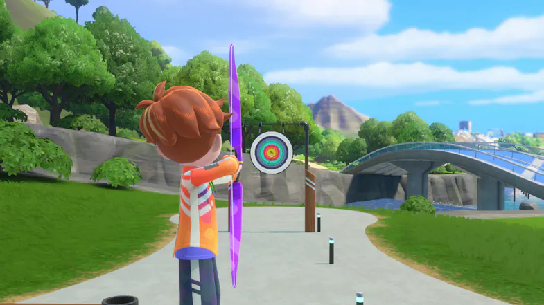 Game scene featuring a character from behind aiming at a target Game scene featuring a character from behind aiming at a target