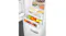 Bottom fridge drawers of SMEG with apples, citrus fruits, berries, and cheese in clear compartments Bottom fridge drawers of SMEG with apples, citrus fruits, berries, and cheese in clear compartments