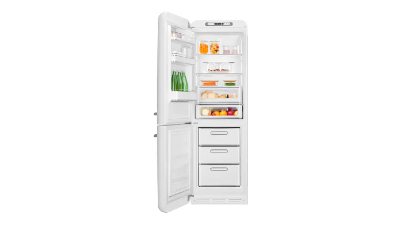 Freestanding white fridge freezer open, filled with groceries, glass bottles, and fresh produce Freestanding white fridge freezer open, filled with groceries, glass bottles, and fresh produce