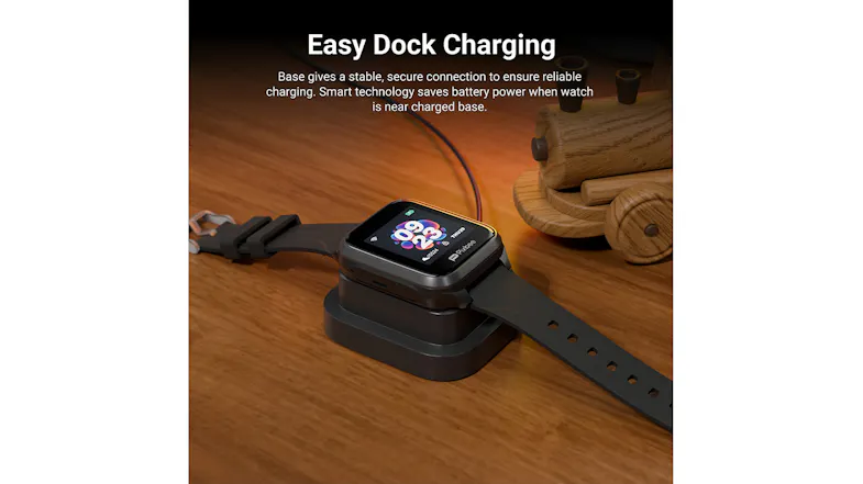 Smartwatch on a wooden desk featuring an easy dock charging setup Smartwatch on a wooden desk featuring an easy dock charging setup