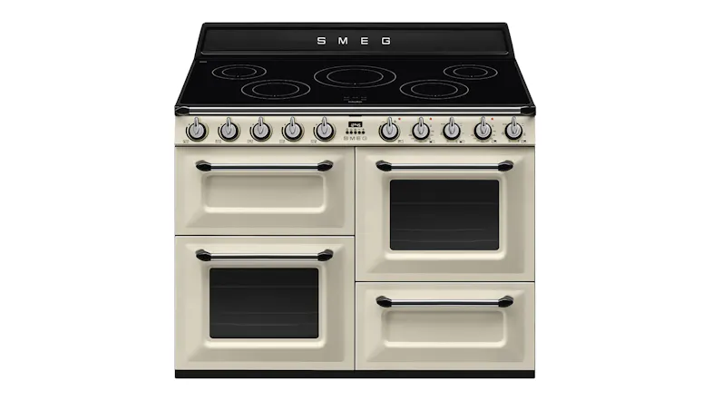 A front view of a Smeg Victoria 110cm Freestanding Oven with 5 Zone Induction Cooktop in cream finish A front view of a Smeg Victoria 110cm Freestanding Oven with 5 Zone Induction Cooktop in cream finish