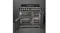 Low-angle view of a black Smeg Victoria freestanding range cooker with bright, warm interior lights glowing inside Low-angle view of a black Smeg Victoria freestanding range cooker with bright, warm interior lights glowing inside