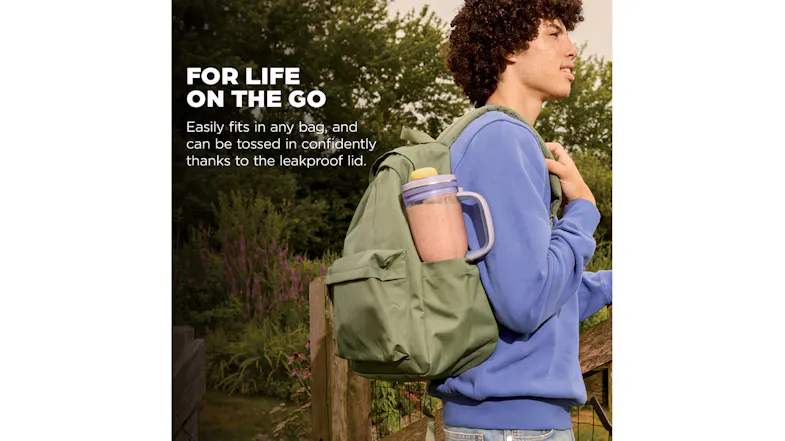 Promo graphic featuring a man carrying the blender mug in a backpack Promo graphic featuring a man carrying the blender mug in a backpack