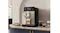 Modern kitchen showcasing the DeLonghi machine on a counter Modern kitchen showcasing the DeLonghi machine on a counter