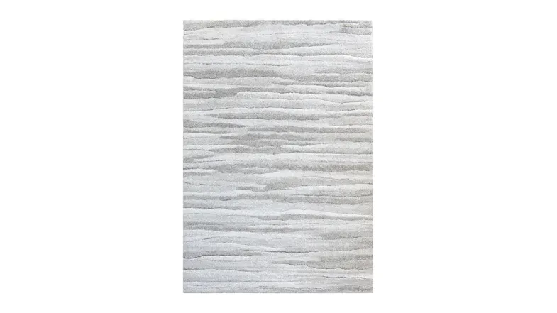 A rectangular grey rug showcasing horizontal waves A rectangular grey rug showcasing horizontal waves