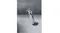 The Chrome Pro cordless hair clipper is standing on a textured surface with a premium metallic finish The Chrome Pro cordless hair clipper is standing on a textured surface with a premium metallic finish