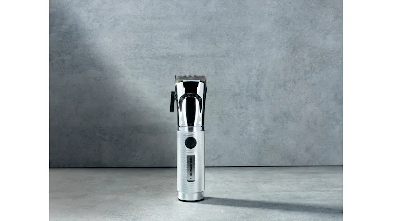 Front view of ConairMAN Chrome Pro cordless hair clipper with stainless steel blades and textured metal grip Front view of ConairMAN Chrome Pro cordless hair clipper with stainless steel blades and textured metal grip