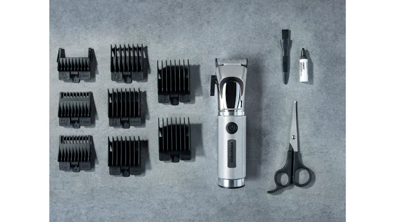 Complete cordless hair clipper grooming kit featuring attachment guards, barber scissors, and maintenance tools Complete cordless hair clipper grooming kit featuring attachment guards, barber scissors, and maintenance tools
