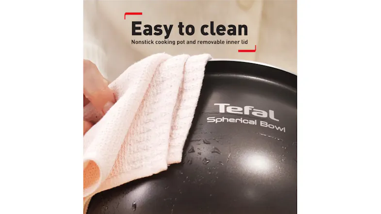 Close-up of Tefal spherical bowl showcasing easy-to-clean nonstick interior and durable finish Close-up of Tefal spherical bowl showcasing easy-to-clean nonstick interior and durable finish