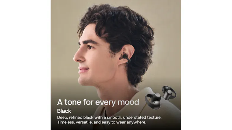 Profile view of a person wearing Shokz wireless earbuds Profile view of a person wearing Shokz wireless earbuds
