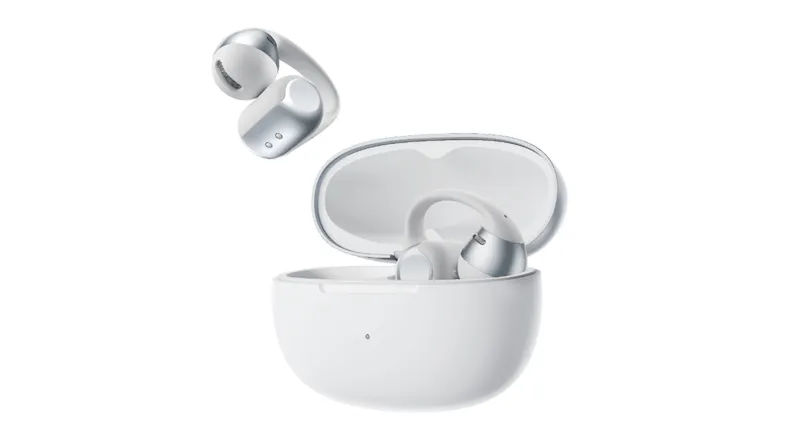 Front view of open charging case with floating earbuds above Front view of open charging case with floating earbuds above