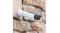 Wire-free security camera mounted on a stone exterior wall, demonstrating weather-resistant construction Wire-free security camera mounted on a stone exterior wall, demonstrating weather-resistant construction