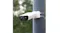 Security camera attached to a pole outdoors, showcasing flexible mounting options Security camera attached to a pole outdoors, showcasing flexible mounting options