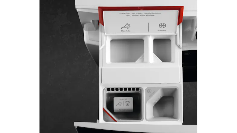 An open detergent drawer showing divided compartments An open detergent drawer showing divided compartments
