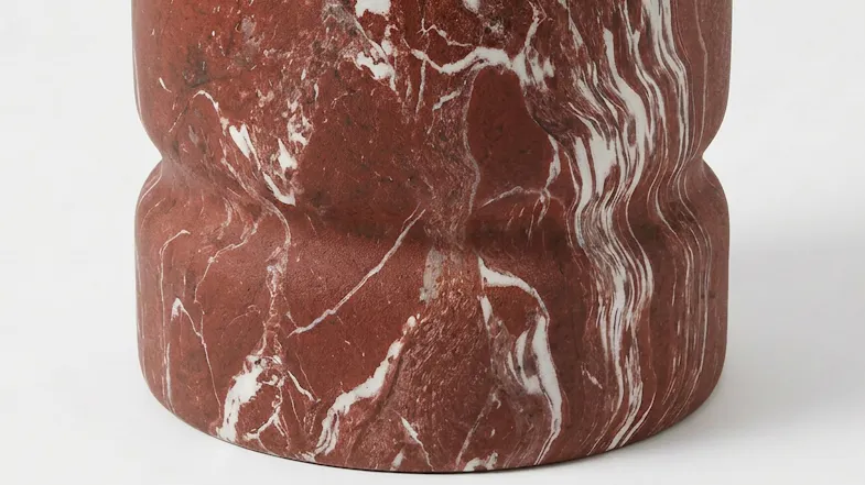 Detailed view of the Nimoy Side Table base, showcasing the sculpted profile Detailed view of the Nimoy Side Table base, showcasing the sculpted profile