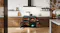 Belling cooker with all doors open, showing cooked roasts and meals inside the black oven cavities Belling cooker with all doors open, showing cooked roasts and meals inside the black oven cavities