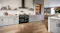 British racing green Belling Cooker featured in a bright modern kitchen with light grey shaker cabinets British racing green Belling Cooker featured in a bright modern kitchen with light grey shaker cabinets