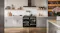 Belling freestanding cooker neatly framed by light grey kitchen cabinets and a pot filler Belling freestanding cooker neatly framed by light grey kitchen cabinets and a pot filler