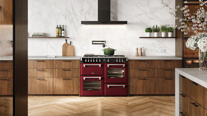 Richmond Deluxe cooker centered between wooden drawers with a white marble backsplash Richmond Deluxe cooker centered between wooden drawers with a white marble backsplash