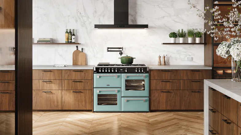 Richmond Deluxe cooker centered between wooden drawers with a white marble backsplash Richmond Deluxe cooker centered between wooden drawers with a white marble backsplash