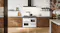 Richmond Deluxe cooker centered between wooden drawers with a white marble backsplash Richmond Deluxe cooker centered between wooden drawers with a white marble backsplash