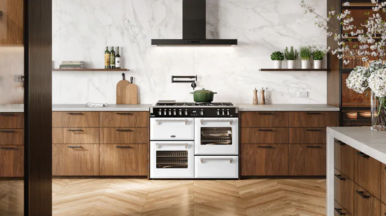 Richmond Deluxe cooker centered between wooden drawers with a white marble backsplash Richmond Deluxe cooker centered between wooden drawers with a white marble backsplash