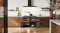 Belling cooker with all doors open, showing cooked roasts and meals inside the black oven cavities Belling cooker with all doors open, showing cooked roasts and meals inside the black oven cavities