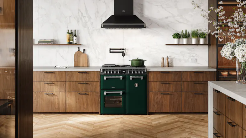 A luxury kitchen with a freestanding oven filled with cooked dishes A luxury kitchen with a freestanding oven filled with cooked dishes