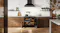 Belling Seafoam Blue range cooker displayed in a kitchen with both oven compartments illuminated Belling Seafoam Blue range cooker displayed in a kitchen with both oven compartments illuminated