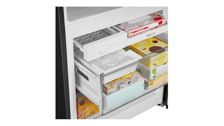 Close-up of the freezer compartment with pull-out drawers, showing organised frozen food storage Close-up of the freezer compartment with pull-out drawers, showing organised frozen food storage