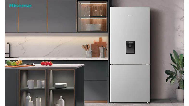 Hisense Fridge Freezer in Stainless Steel displayed in a modern kitchen, featuring a flat-door design Hisense Fridge Freezer in Stainless Steel displayed in a modern kitchen, featuring a flat-door design