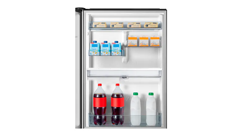 Close-up of the refrigerator interior with drinks and food items arranged on shelves and door balconies Close-up of the refrigerator interior with drinks and food items arranged on shelves and door balconies