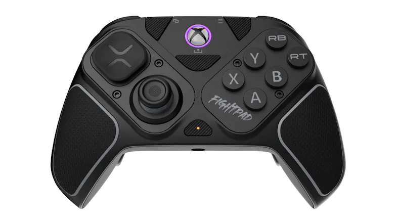Front view of a black Victrix Pro BFG wireless controller for PlayStation featuring purple accents and textured grips Front view of a black Victrix Pro BFG wireless controller for PlayStation featuring purple accents and textured grips