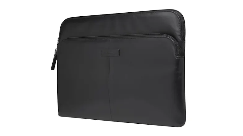 Left facing view of the black leather laptop sleeve, showcasing the minimalist design Left facing view of the black leather laptop sleeve, showcasing the minimalist design