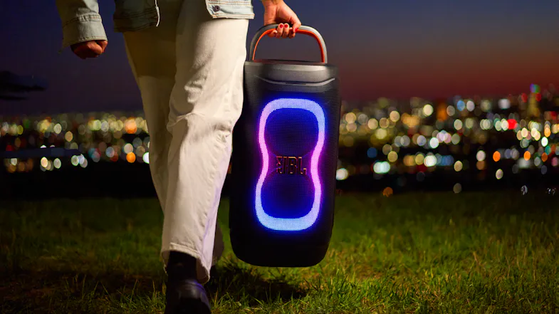 A view of a person carrying the speaker A view of a person carrying the speaker