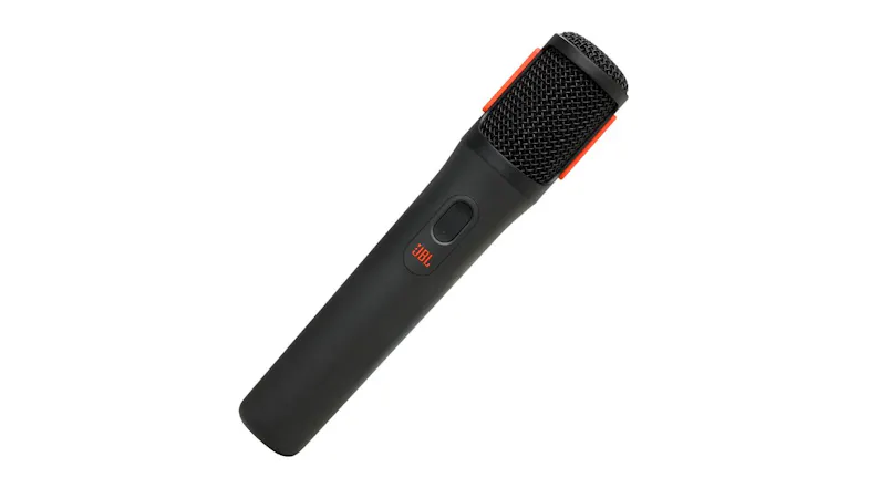 Close-up angled view of a JBL wireless microphone with black mesh grille, black body, and controls Close-up angled view of a JBL wireless microphone with black mesh grille, black body, and controls
