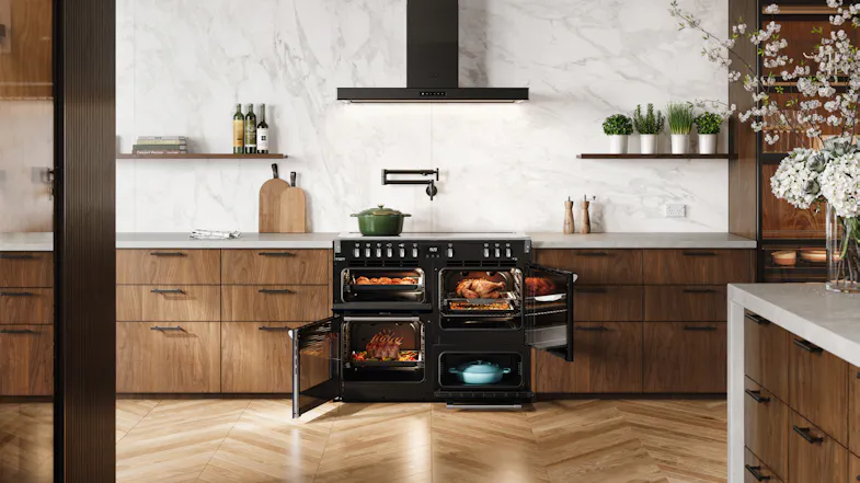 A front view of the Belling Freestanding Oven with Cooktop integrated in a modern home and has all of its doors opened A front view of the Belling Freestanding Oven with Cooktop integrated in a modern home and has all of its doors opened