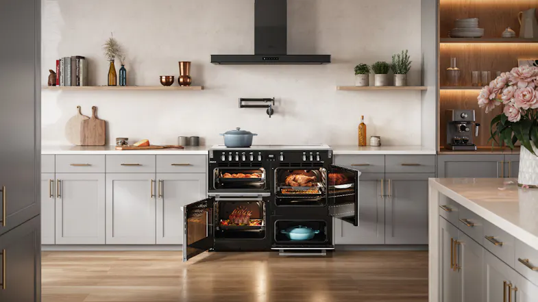 A view of the unit with all of its oven doors opened A view of the unit with all of its oven doors opened