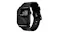 An angled view of a black Apple Watch featuring a matching black leather band, matte black hardware, and custom lugsA top-down overhead view of a black Apple Watch with a long black leather strap laid flat. An angled view of a black Apple Watch featuring a matching black leather band, matte black hardware, and custom lugsA top-down overhead view of a black Apple Watch with a long black leather strap laid flat.