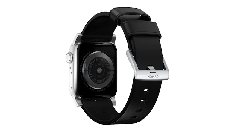 A rear view of a smartwatch showing back optical sensor, leather band, and a metal buckle A rear view of a smartwatch showing back optical sensor, leather band, and a metal buckle