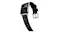 Angled view of a silver Apple Watch featuring a black leather strap and silver pin buckle Angled view of a silver Apple Watch featuring a black leather strap and silver pin buckle