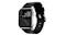 Side angle view of a silver Apple Watch with a black leather band and silver lugs Side angle view of a silver Apple Watch with a black leather band and silver lugs