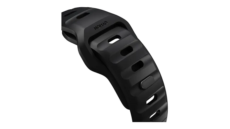 Close-up of a black perforated sport band with a pin-and-tuck closure and textured design details Close-up of a black perforated sport band with a pin-and-tuck closure and textured design details
