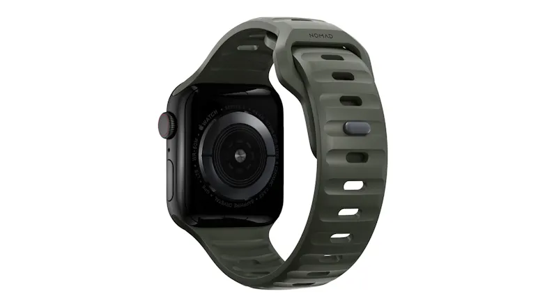 Rear view of a black smartwatch with an ash green sport band, showing the heart rate sensor and buckle Rear view of a black smartwatch with an ash green sport band, showing the heart rate sensor and buckle