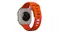 Rear view of an orange smartwatch showing the sensor array, titanium case, and ventilated sport band Rear view of an orange smartwatch showing the sensor array, titanium case, and ventilated sport band