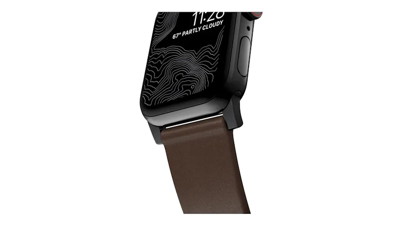 A close-up angle of a smartwatch case lug and a leather strap, showing topographic digital display details A close-up angle of a smartwatch case lug and a leather strap, showing topographic digital display details