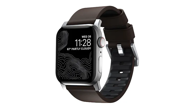 Nomad Active Band Pro with a brown strap, featuring a dark digital display with topographic design Nomad Active Band Pro with a brown strap, featuring a dark digital display with topographic design