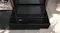 Open black Neff N 90 Series 14cm Built-In Steam Drawer with a glass lid and touch controls, viewed from above Open black Neff N 90 Series 14cm Built-In Steam Drawer with a glass lid and touch controls, viewed from above