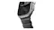 Close-up angle of Apple Watch Ultra titanium case lug attached to a ribbed rubber strap with topographic display Close-up angle of Apple Watch Ultra titanium case lug attached to a ribbed rubber strap with topographic display