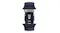 Close-up view of a rubber watch strap with titanium buckle hardware and watch attachment lugs on top and bottom Close-up view of a rubber watch strap with titanium buckle hardware and watch attachment lugs on top and bottom